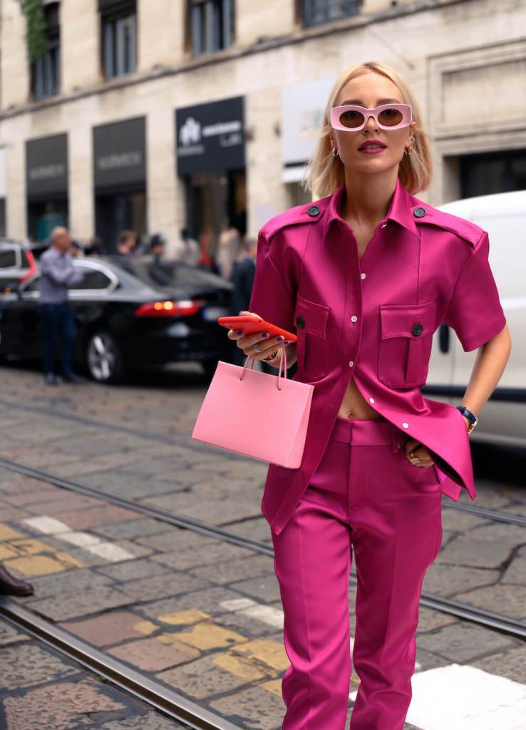Woman wears pink at Fashion Week