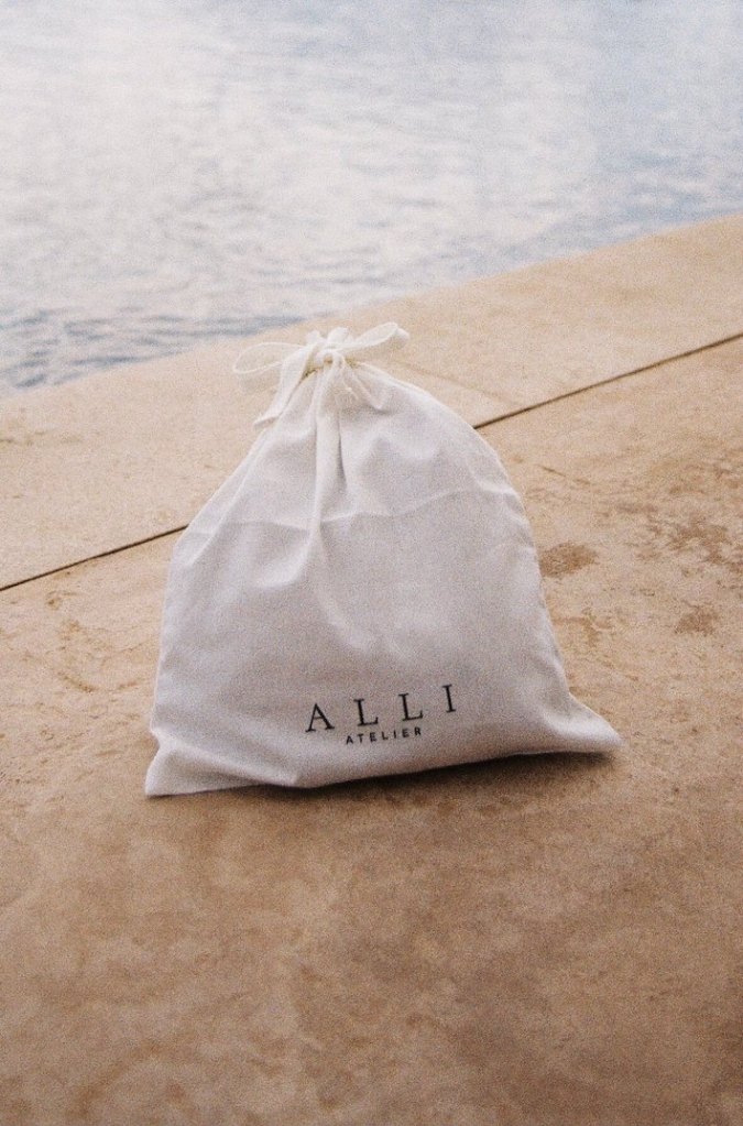 Organic cotton drawstring dust bag for handbags and belongings. Natural undyed and unbleached sustainably sourced fabric bag