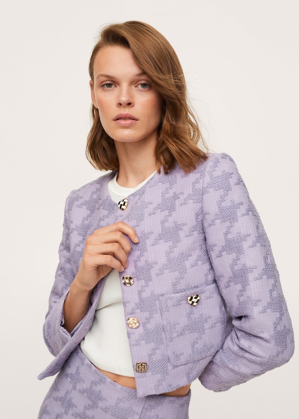 model wearing lavender houndstooth jacket