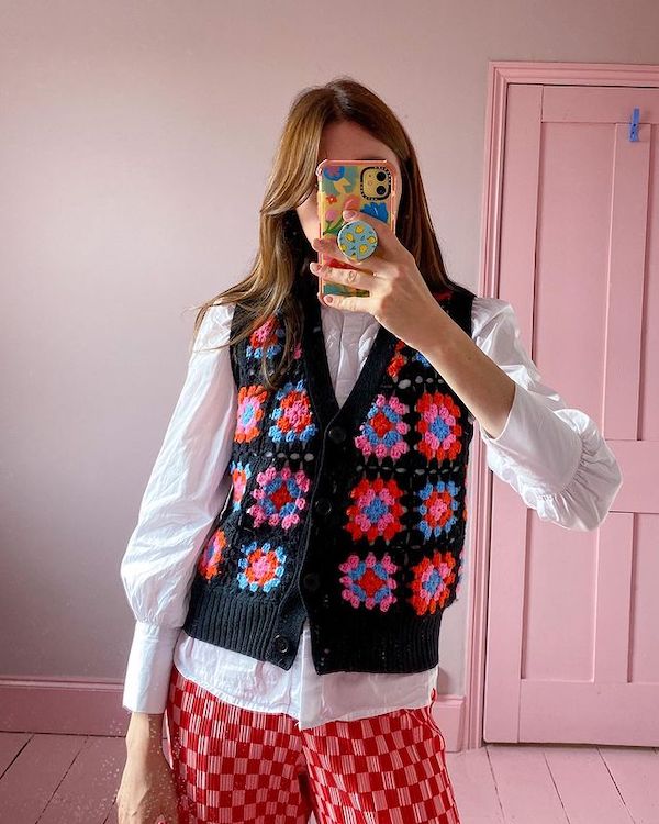 woman wearing crocheted vest
