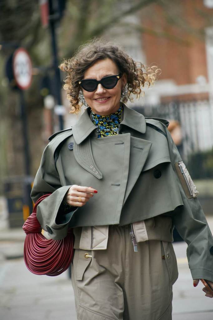 woman wearing a cropped jacket/coat at london fashion week