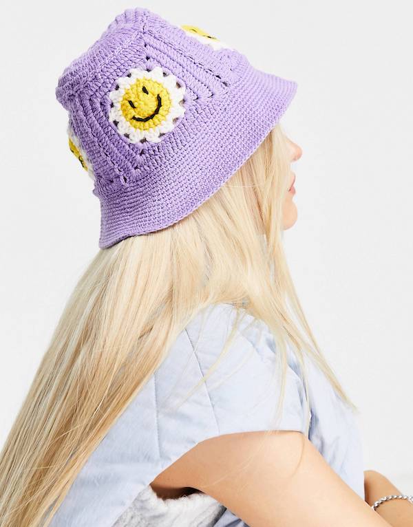 ASOS DESIGN crochet bucket hat with happy detail