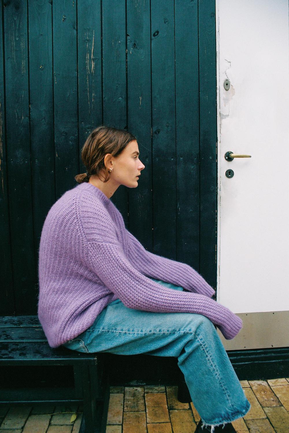 Model wears lilac sale jumper from Zara