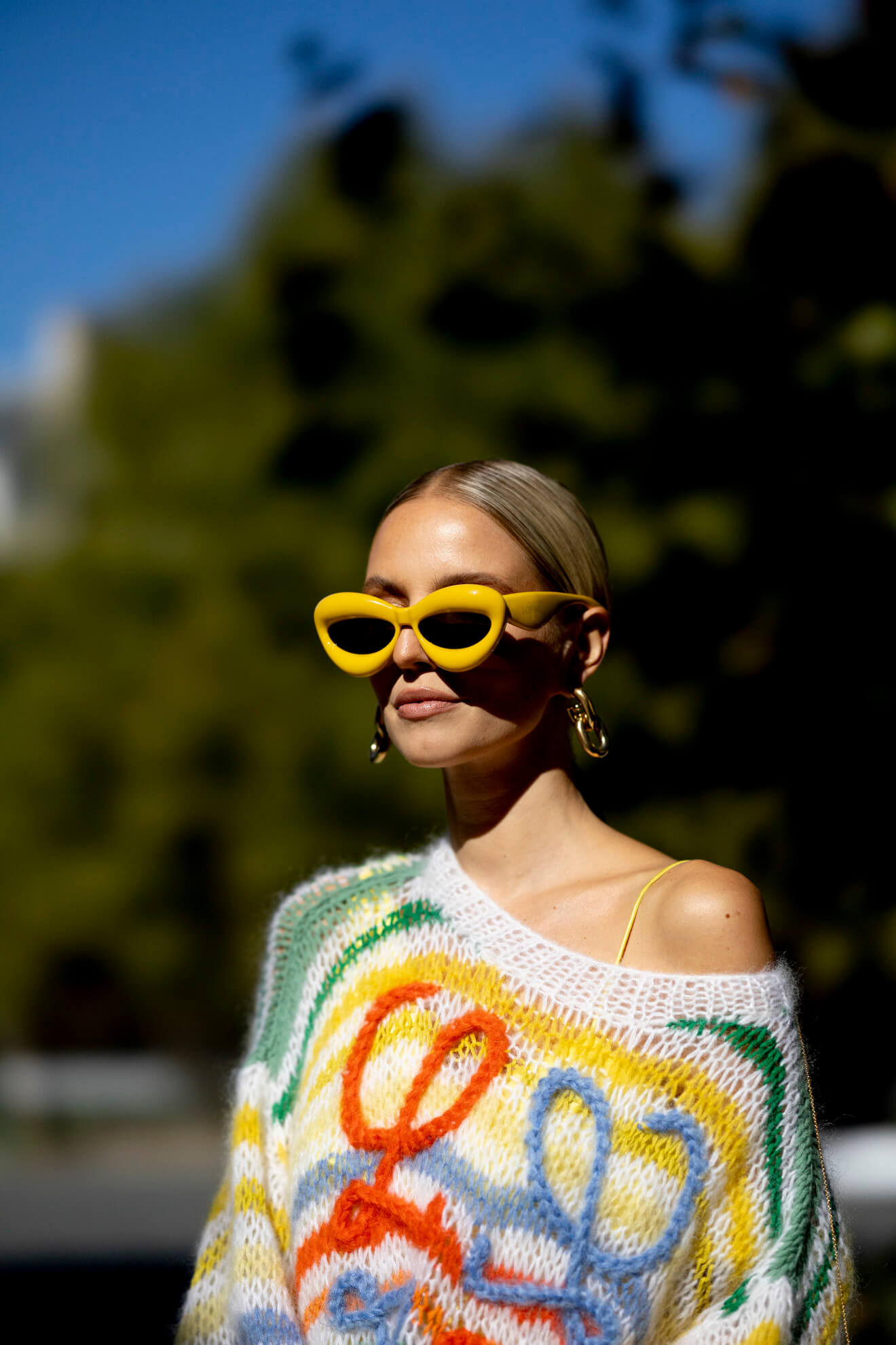 Leonie Hanne at paris fashion week wearing oversized sunglasses