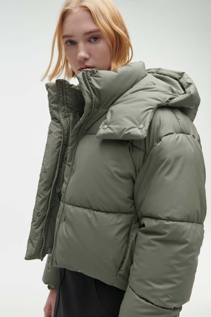 Woman wearing puffer jacket from Zara