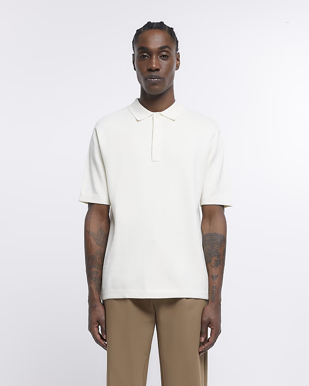 Ecru regular fit knitted polo shirt from River Island  