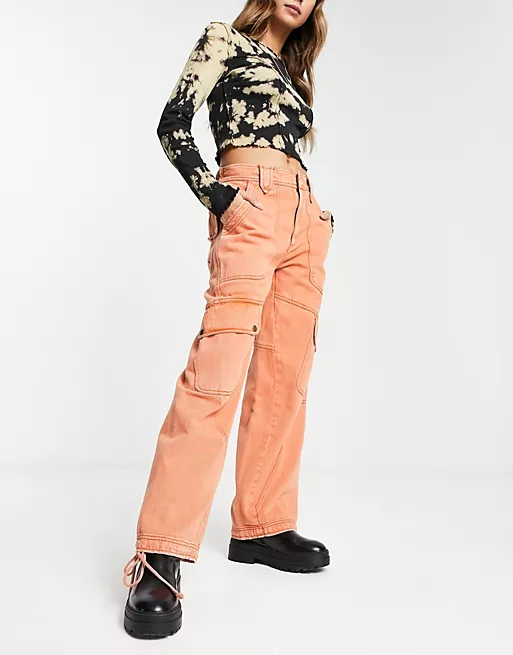 Utility cargo trousers in washed orange from Free People  