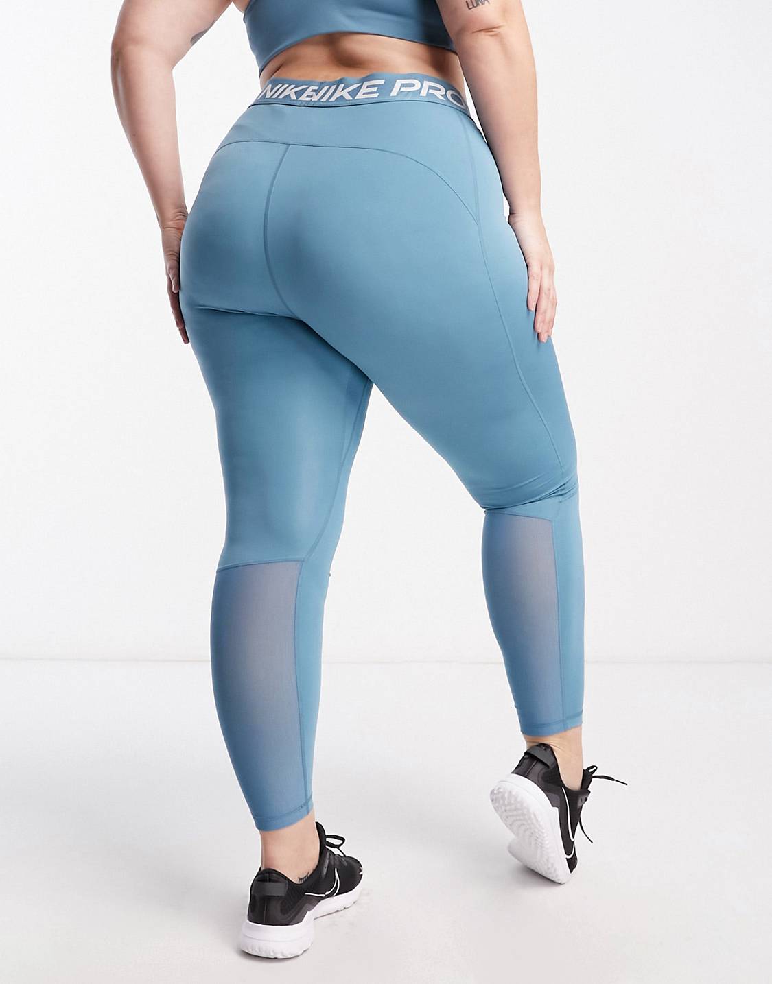 
Nike Pro Training Plus 365 high waisted leggings in aqua blue